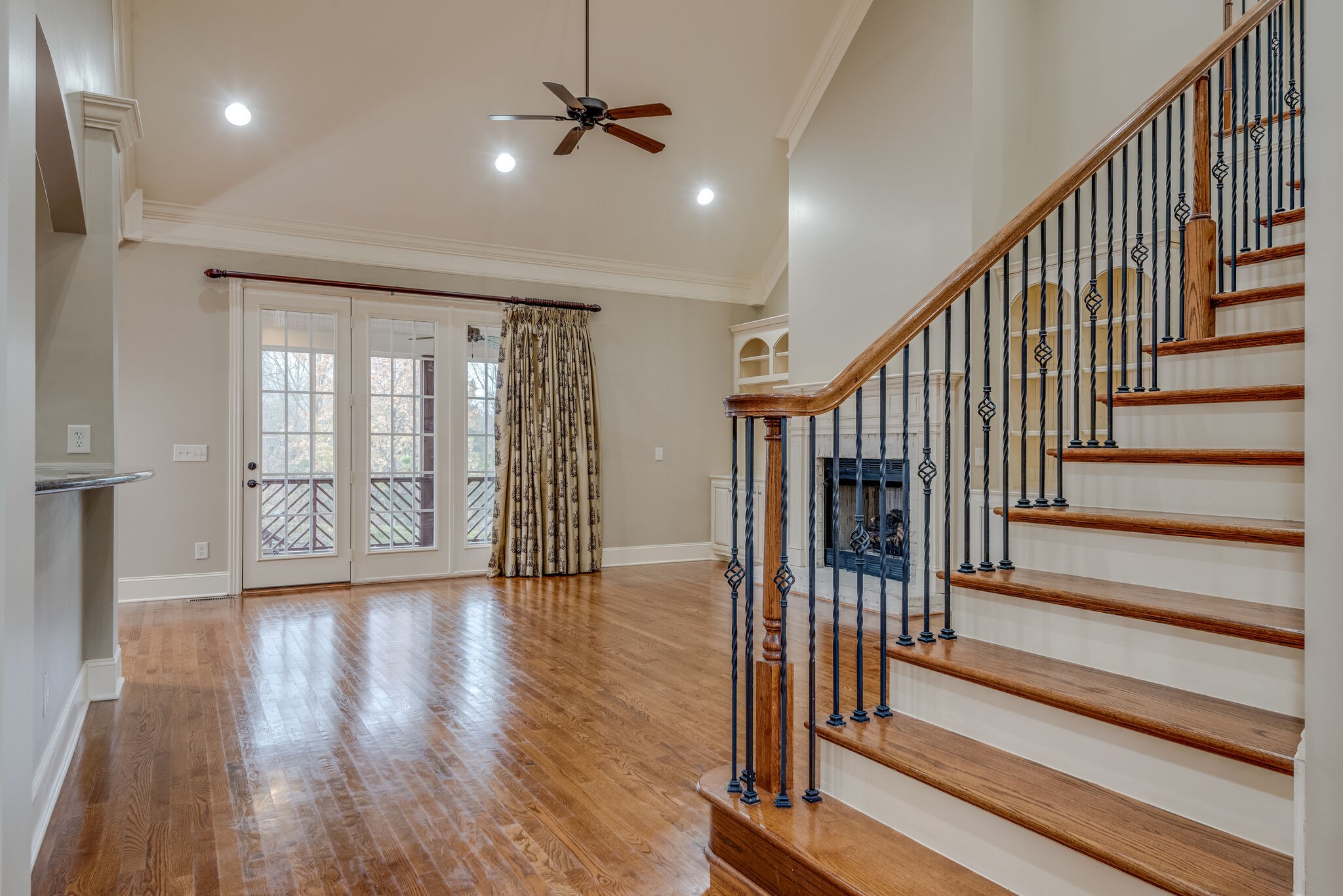 281 King Arthur Circle Franklin, TN 37067 - Photo 9 of 47 a view of staircase with wooden floor and fan