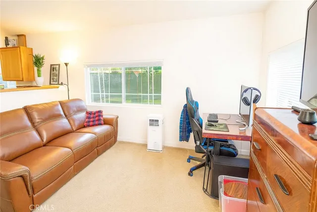 a workspace with furniture and a window