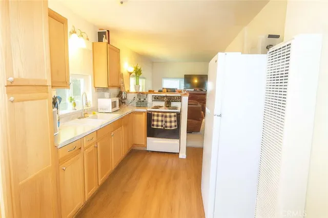 a large kitchen with a lot of counter top space