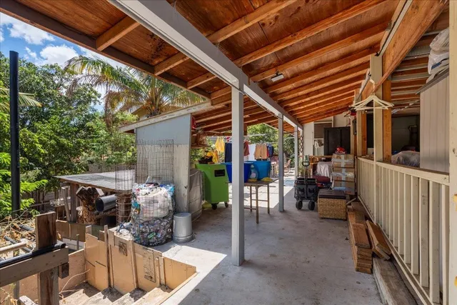 a view of living room and patio area