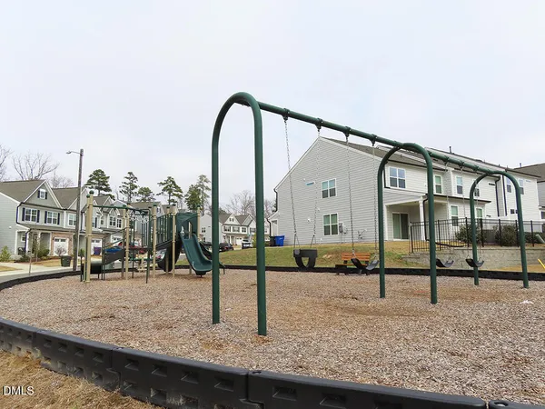 a view of swimming pool with a patio