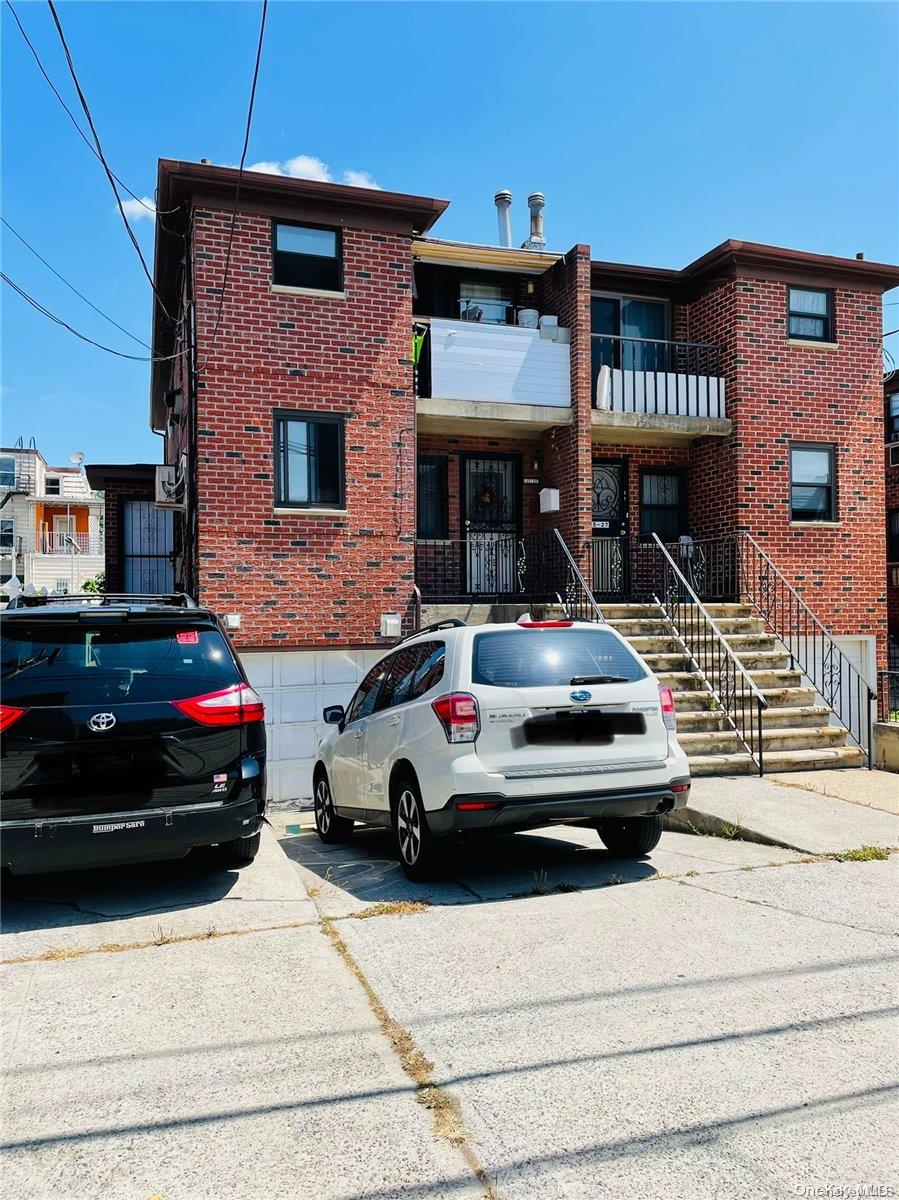 a car parked in front of a building