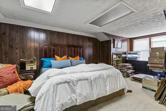 a view of a living room and entryway