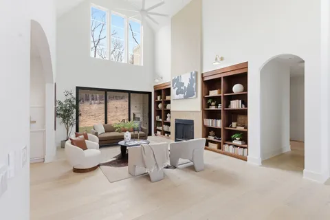 a kitchen with stainless steel appliances a sink and a cabinets
