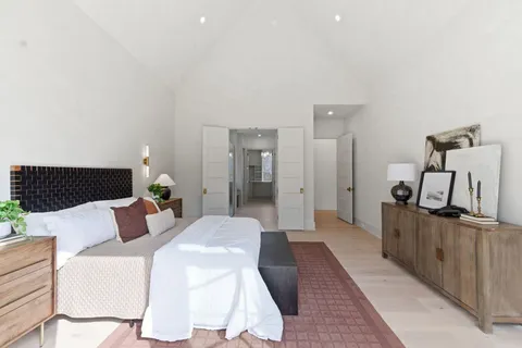 a view of a hallway with windows