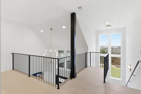 a view of an entryway with a balcony