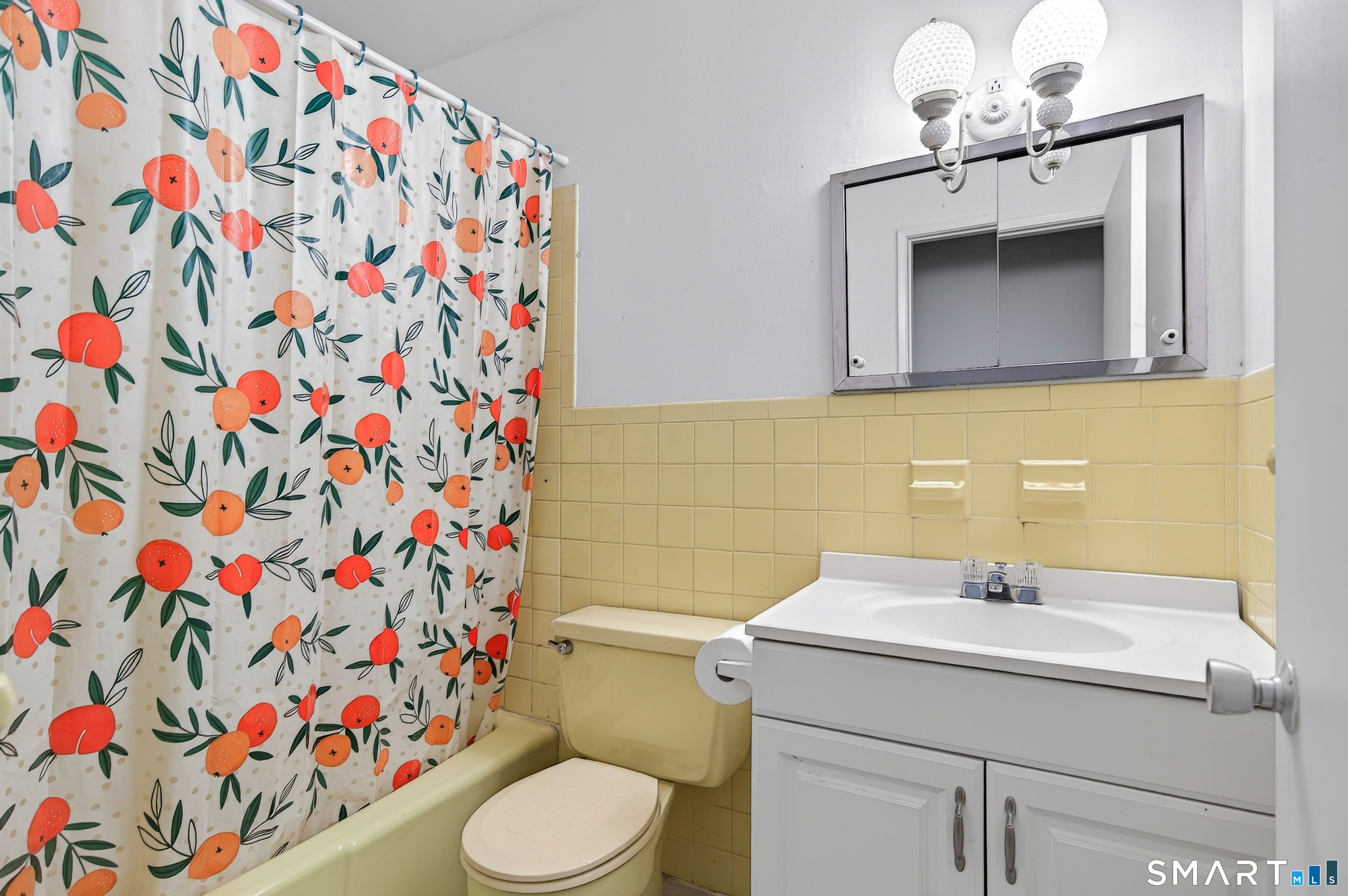 4 Pepper Pond Road Sherman, CT 06784 - Photo 17 of 33 a bathroom with a sink and mirror with toilet