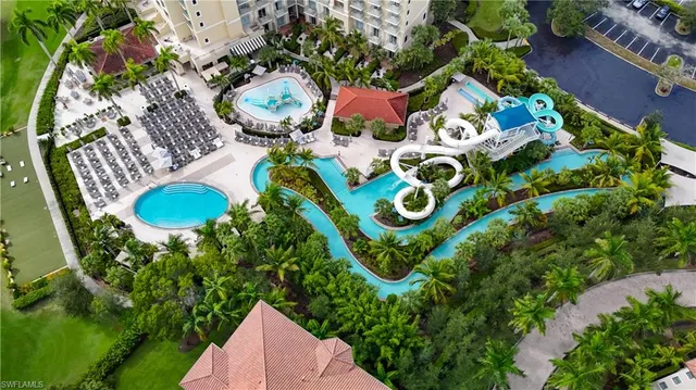 a bird view of multi story residential houses with outdoor space