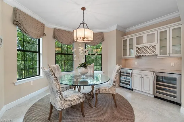 a view of a dining room with furniture window and outside view
