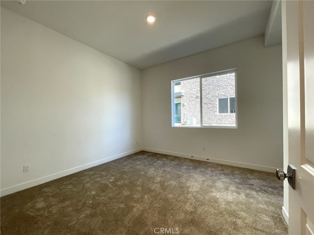 141 Baluster Irvine, CA 92618 - Photo 18 of 40 an empty room with a window