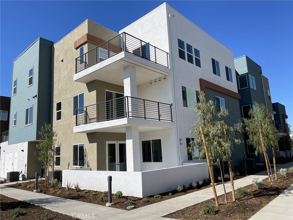 141 Baluster Irvine, CA 92618 - Photo 2 of 40 a front view of a building with street