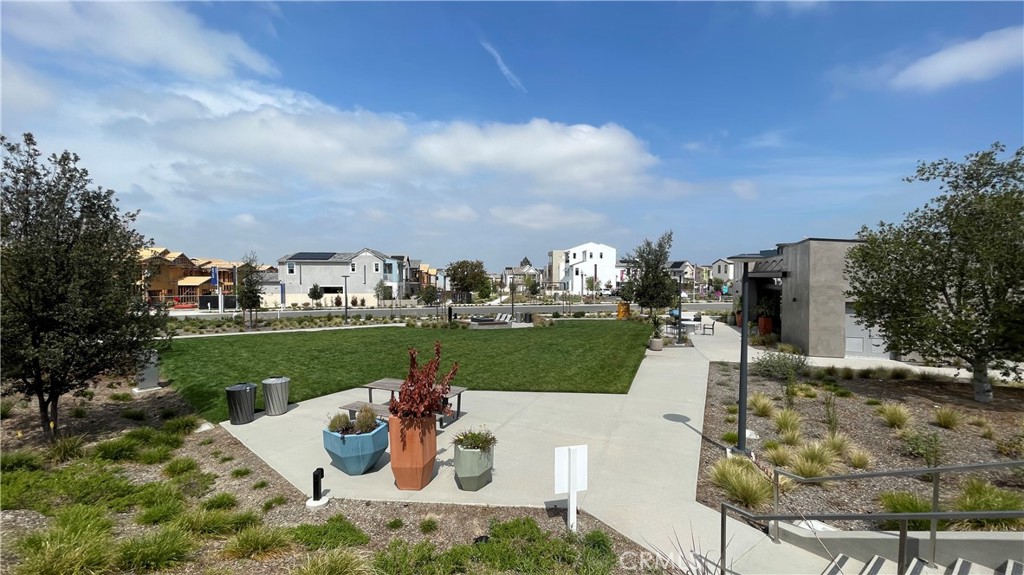 141 Baluster Irvine, CA 92618 - Photo 31 of 40 a view of a lake with a garden