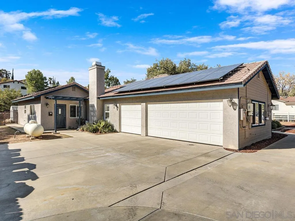 16304 Dartolo Road Ramona, CA 92065 - Photo 31 of 36 a front view of a house with a garage