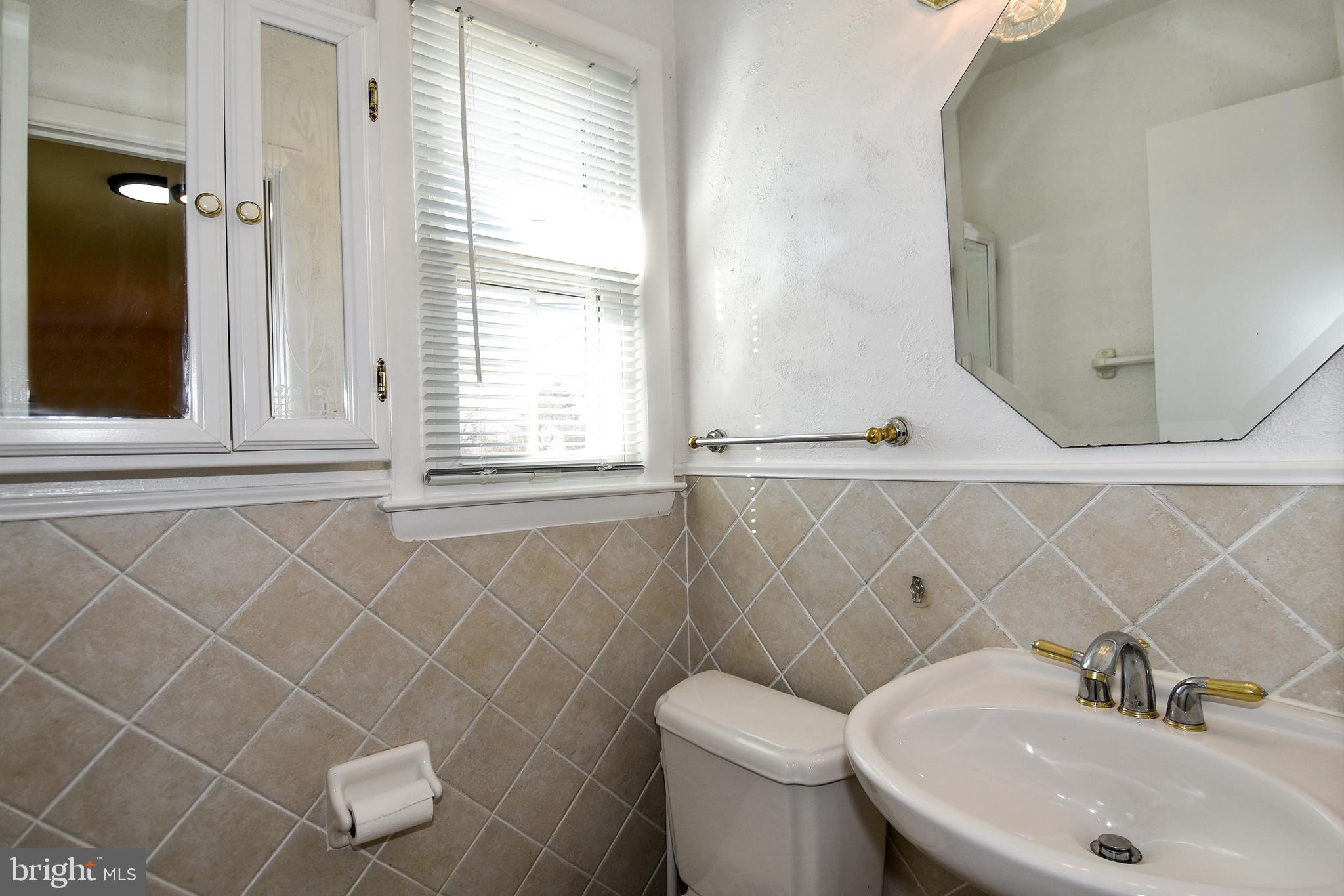 13125 Foxhall Drive Silver Spring, MD 20906 - Photo 22 of 51 Main Level Half Bath