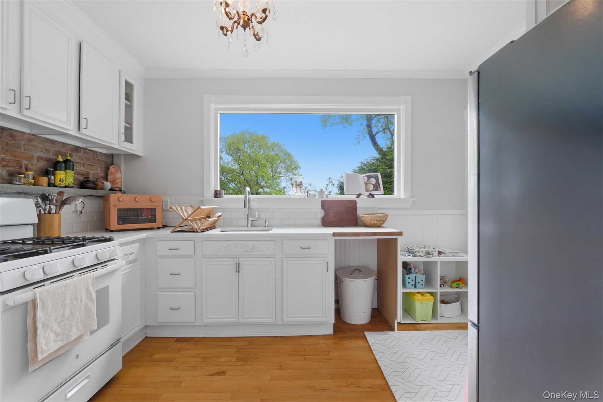 988 Rte 9W Nyack, NY 10960 - Photo 7 of 24 a kitchen with a sink cabinets and window
