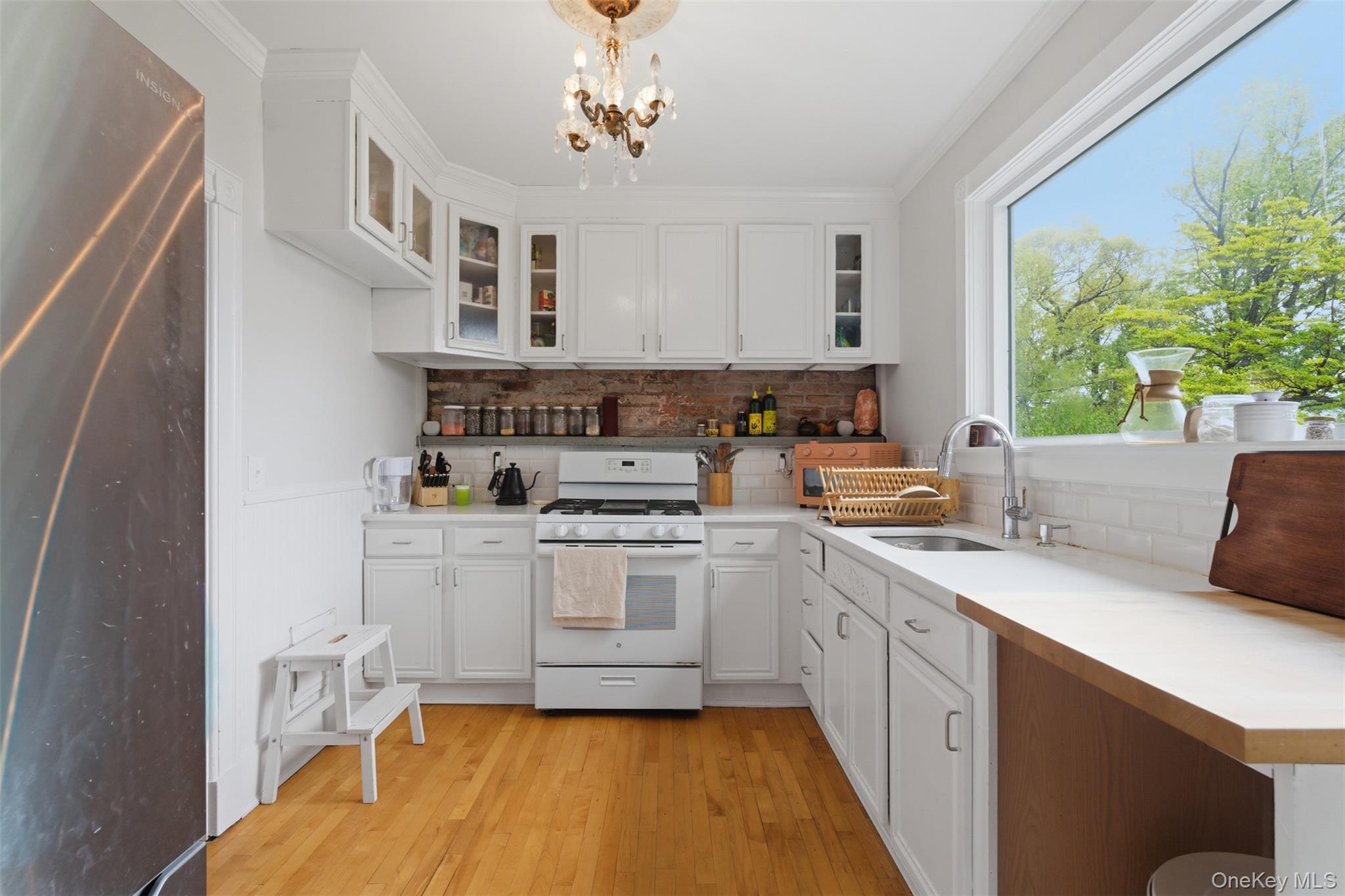 988 Rte 9W Nyack, NY 10960 - Photo 8 of 24 a kitchen with a sink cabinets and window
