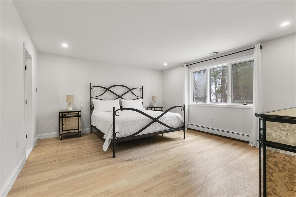 5 Crestwood Road North Reading, MA 01864 - Photo 14 of 40 a bedroom with a bed and a window