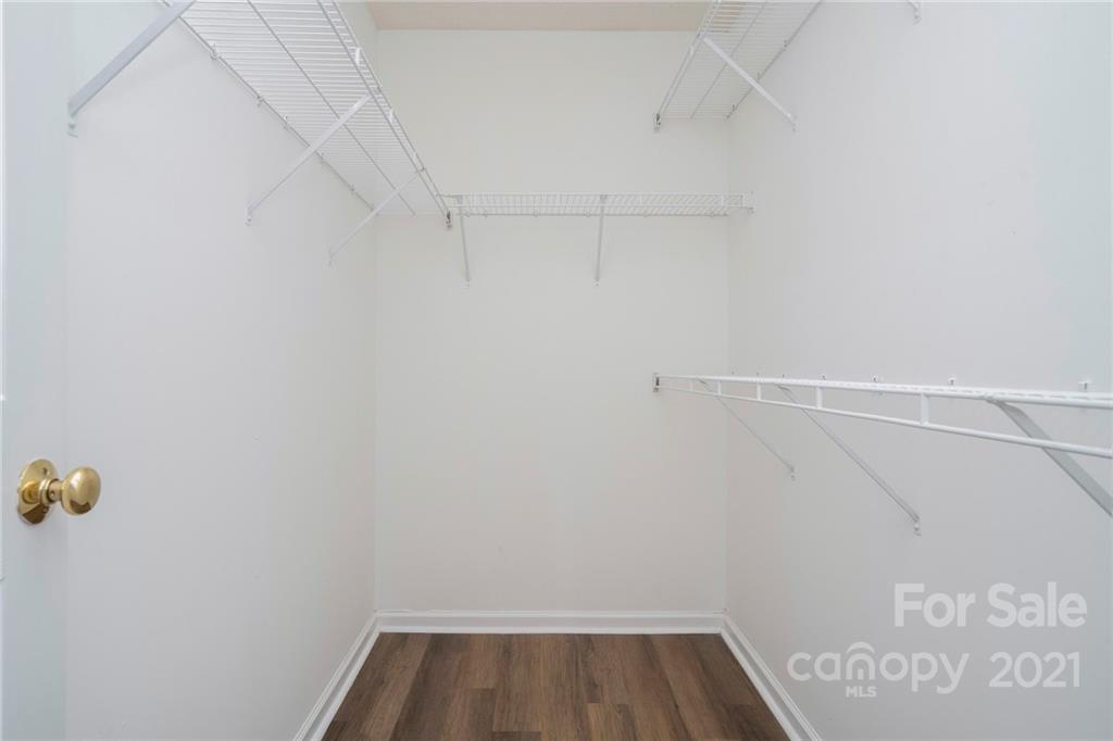 2432 River Chase Drive Monroe, NC 28110 - Photo 12 of 18 a view of storage and utility room with racks on the wall