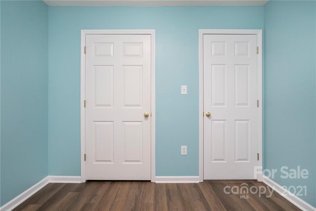 2432 River Chase Drive Monroe, NC 28110 - Photo 18 of 18 an empty room with closet and wooden floor