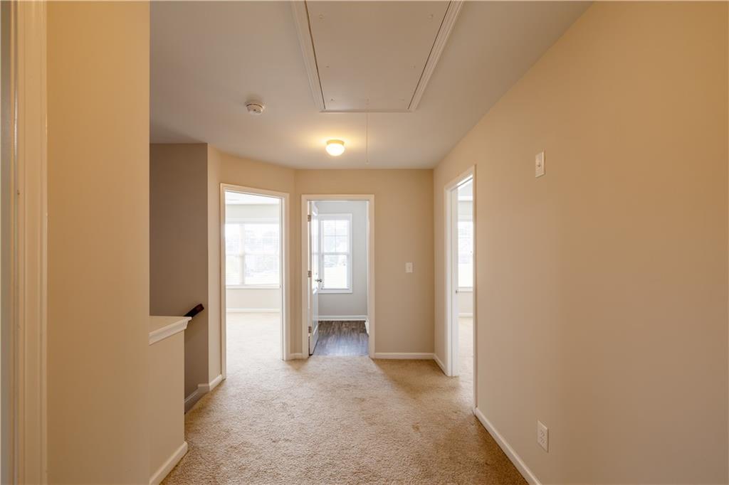 221 Winterset Circle Hoschton, GA 30548 - Photo 11 of 23 a view of entryway with wooden floor