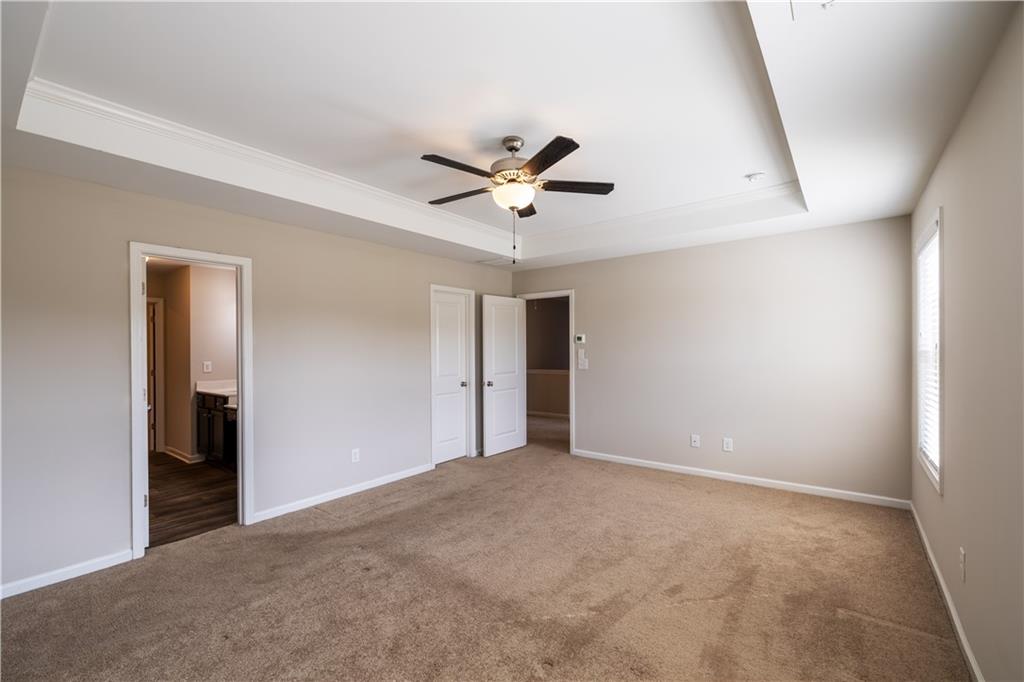 221 Winterset Circle Hoschton, GA 30548 - Photo 13 of 23 a view of an empty room