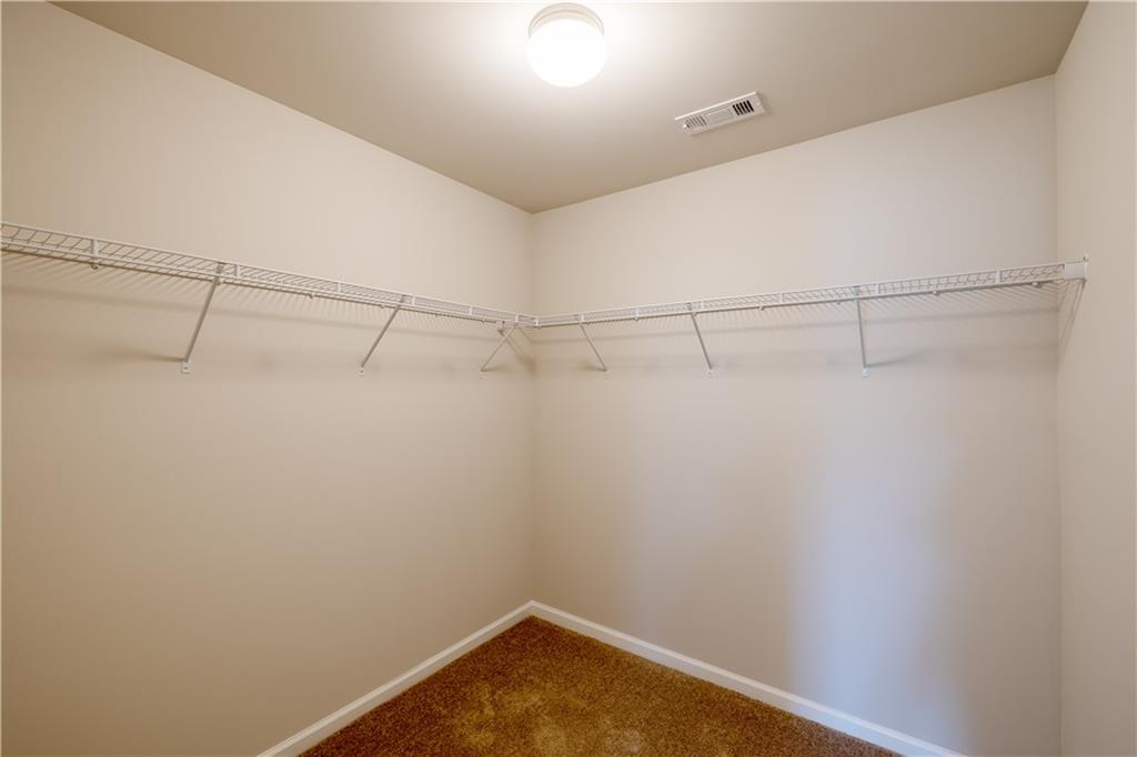 221 Winterset Circle Hoschton, GA 30548 - Photo 16 of 23 a view of a small room