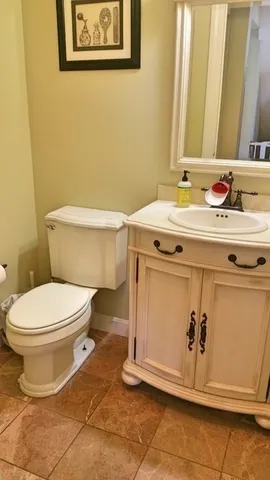 a bathroom with a sink and a toilet