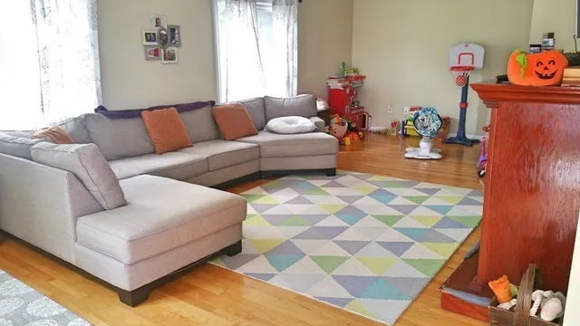 a living room with furniture and a couch