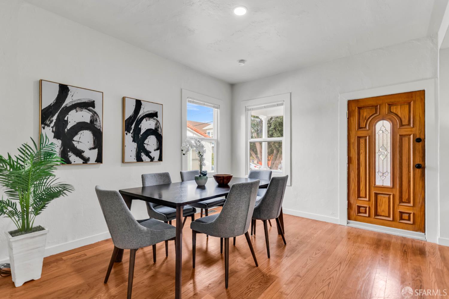 2918 Newbury Street Berkeley, CA 94703 - Photo 12 of 42 a view of a a dining room with furniture window and wooden floor