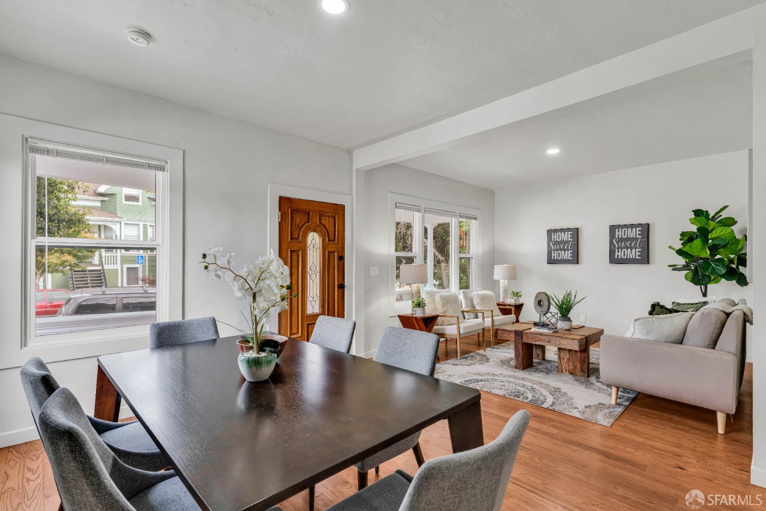 2918 Newbury Street Berkeley, CA 94703 - Photo 15 of 42 a view of a dining room with furniture and wooden floor