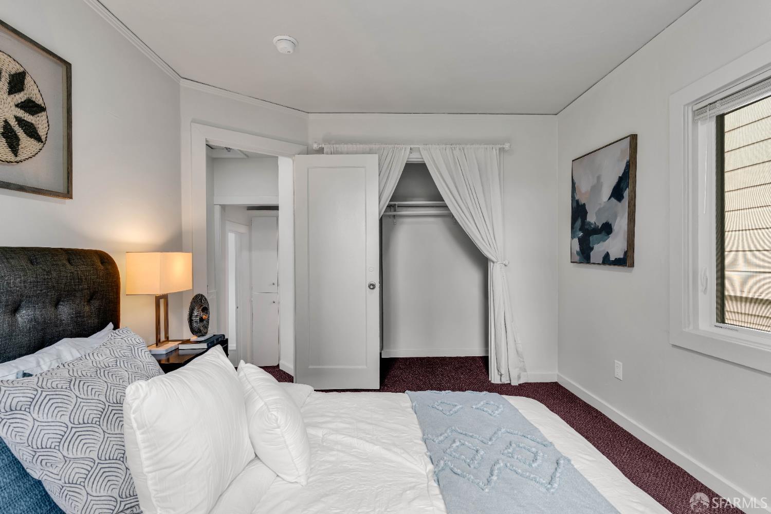 2918 Newbury Street Berkeley, CA 94703 - Photo 34 of 42 a bedroom with a bed and a window