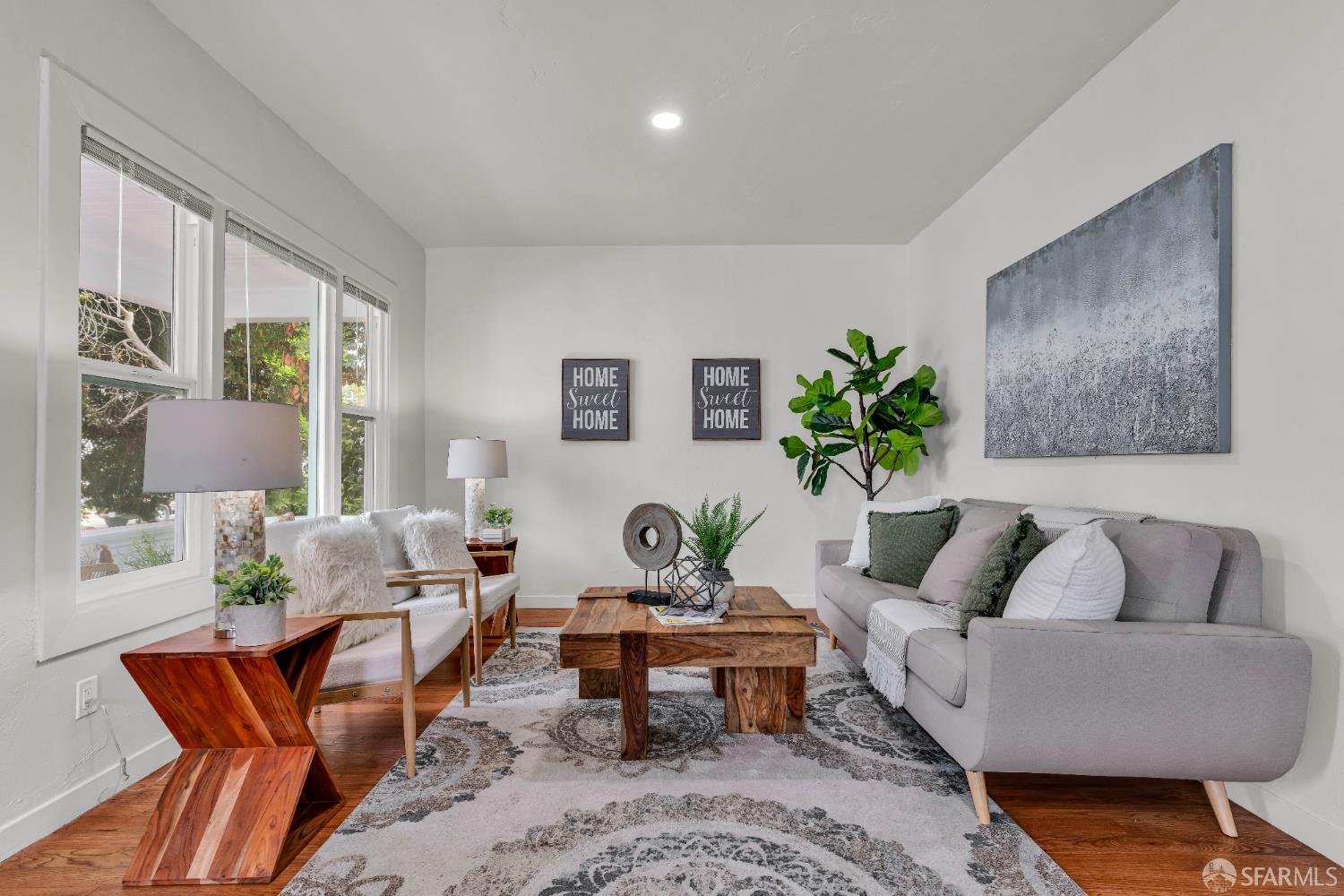 2918 Newbury Street Berkeley, CA 94703 - Photo 7 of 42 a living room with furniture and wooden floor