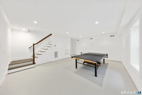 a living room with stairs