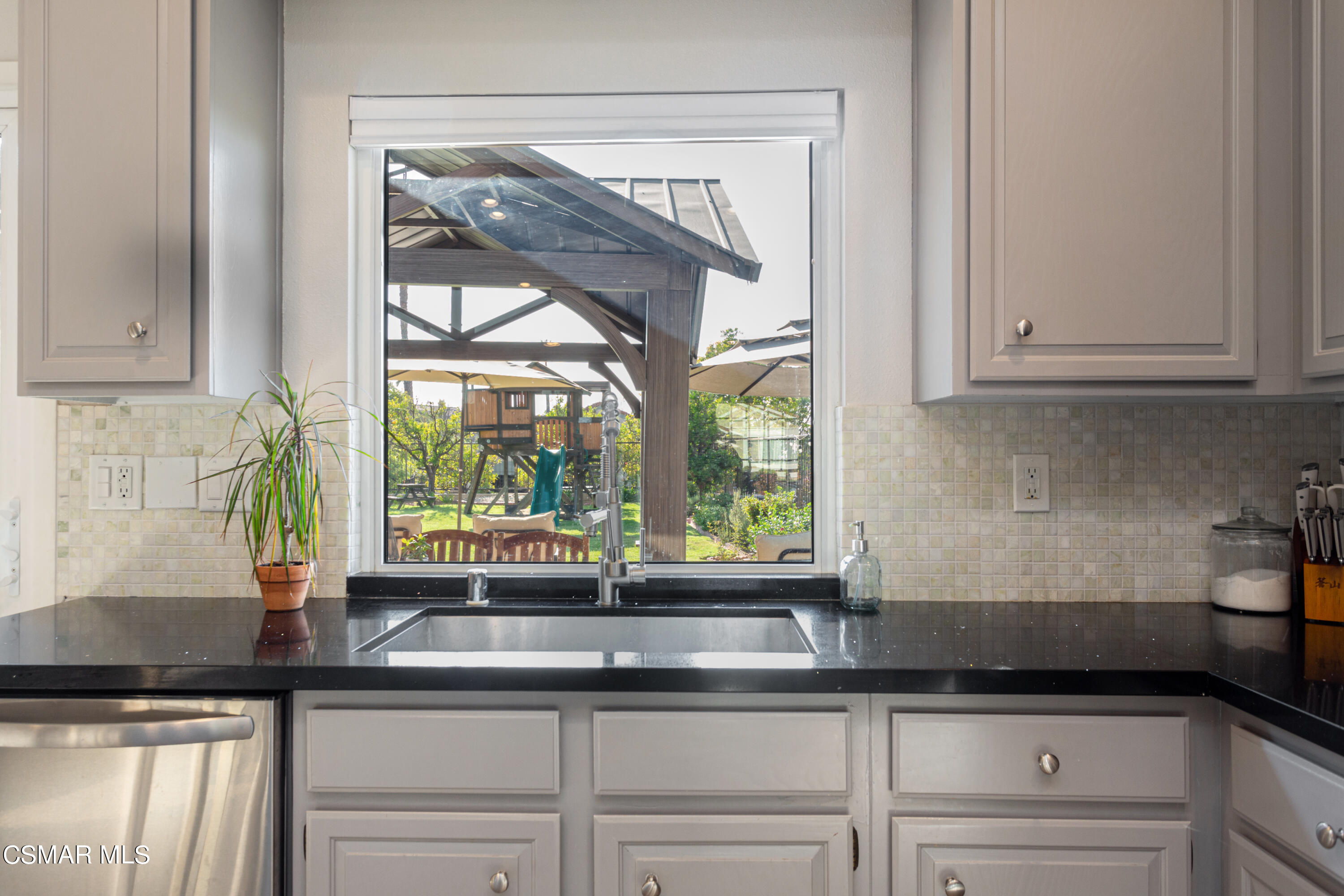 4249 Laurelhurst Road Moorpark, CA 93021 - Photo 12 of 30 a kitchen with a sink and large window