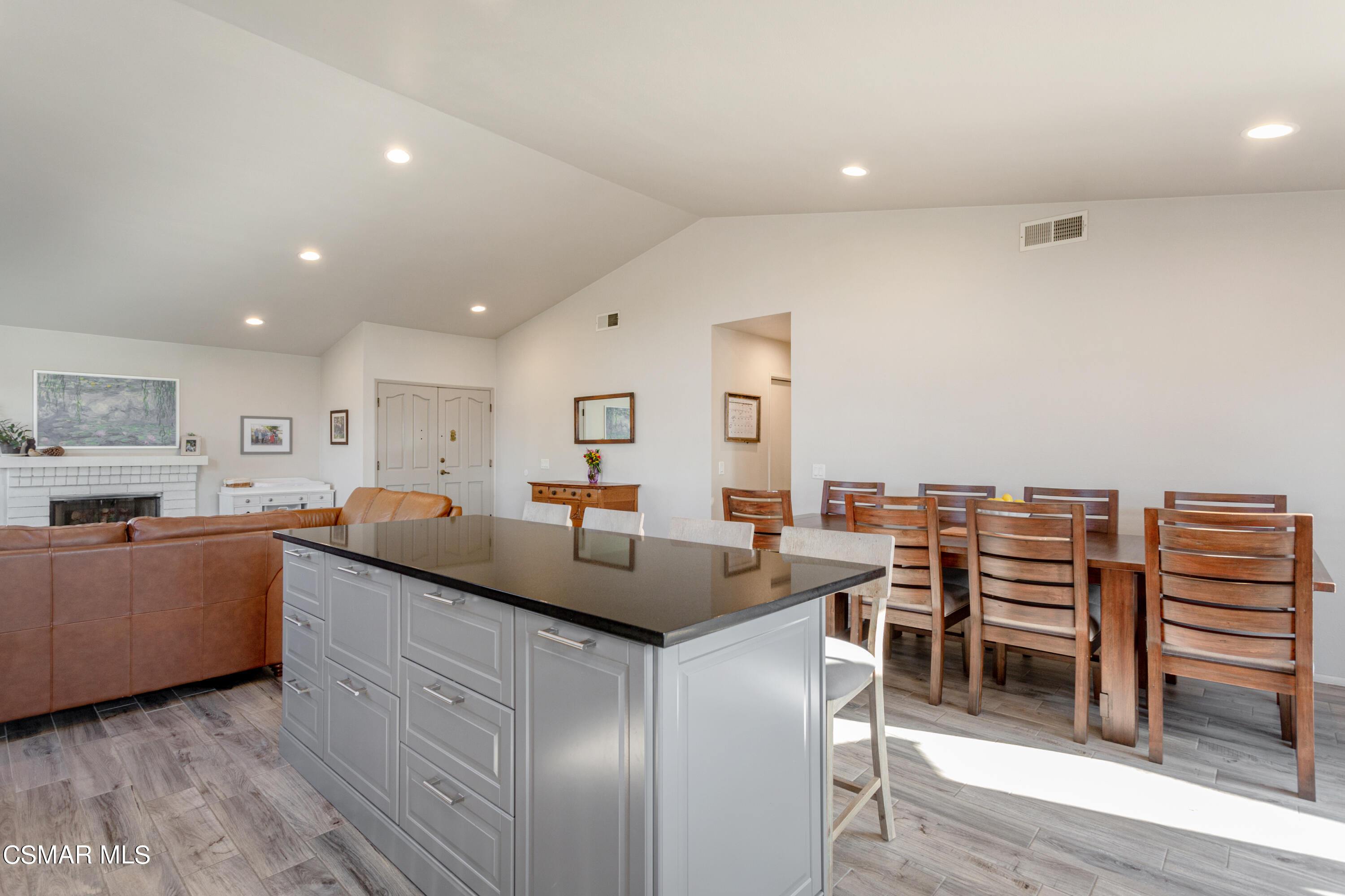 4249 Laurelhurst Road Moorpark, CA 93021 - Photo 13 of 30 a kitchen with stainless steel appliances granite countertop a sink and a refrigerator