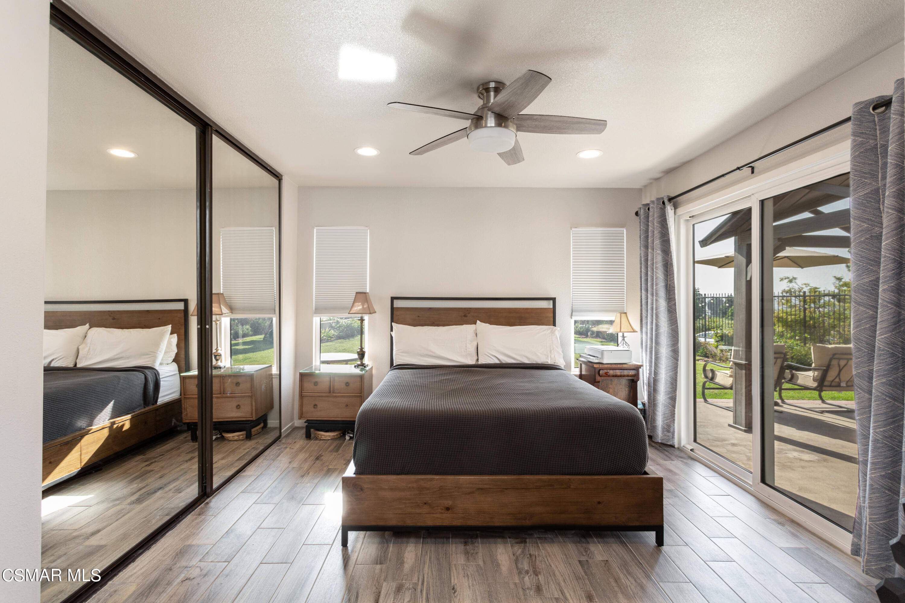 4249 Laurelhurst Road Moorpark, CA 93021 - Photo 15 of 30 a bedroom with a large bed and a large window