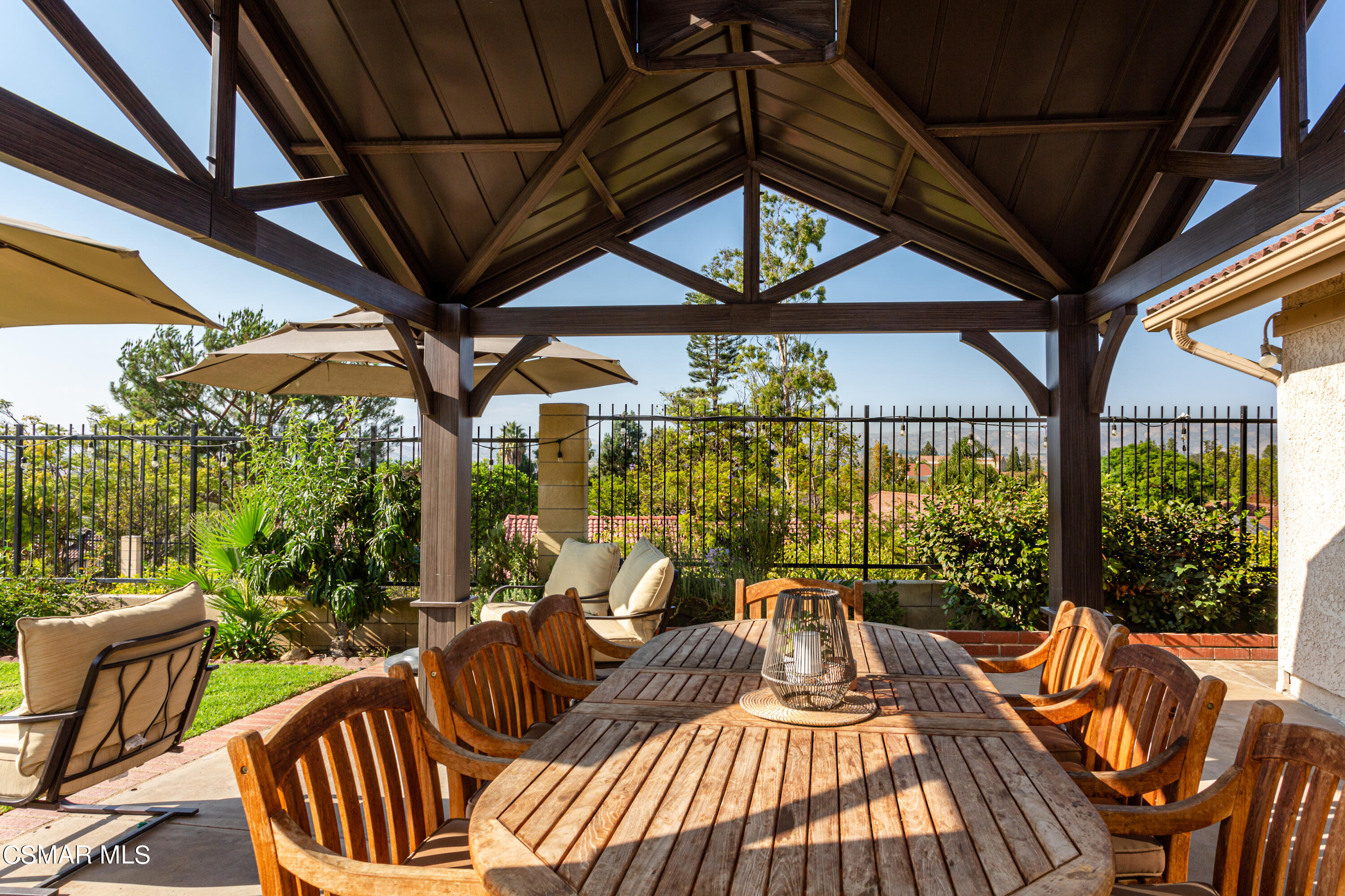 4249 Laurelhurst Road Moorpark, CA 93021 - Photo 23 of 30 a view of a patio with a table chairs and a patio