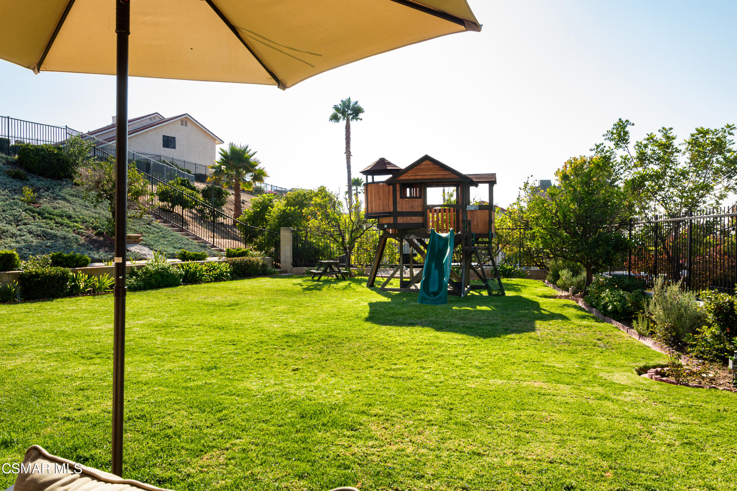 4249 Laurelhurst Road Moorpark, CA 93021 - Photo 25 of 30 a view of a big yard with potted plants