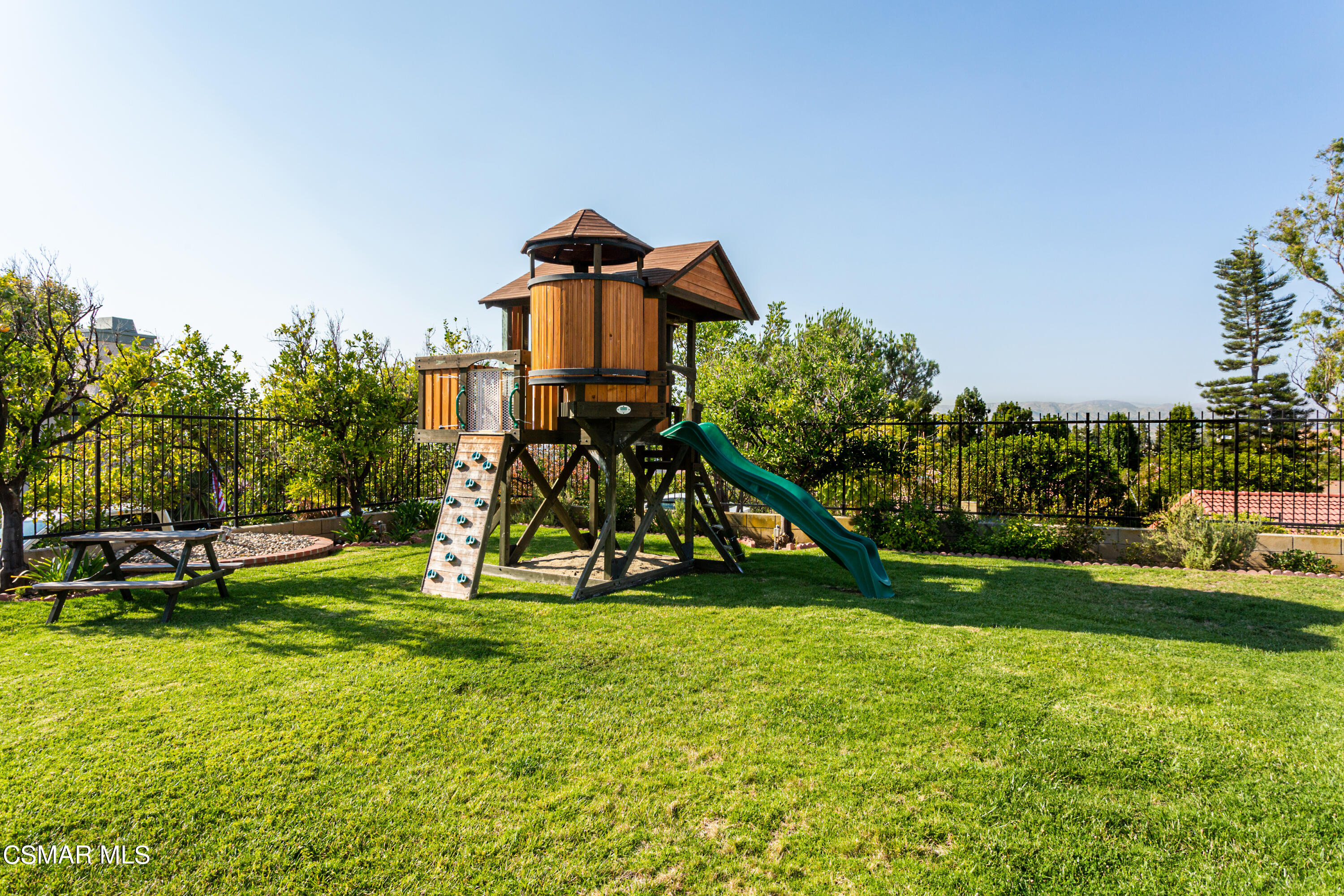 4249 Laurelhurst Road Moorpark, CA 93021 - Photo 26 of 30 a view of a park with swings and a bench