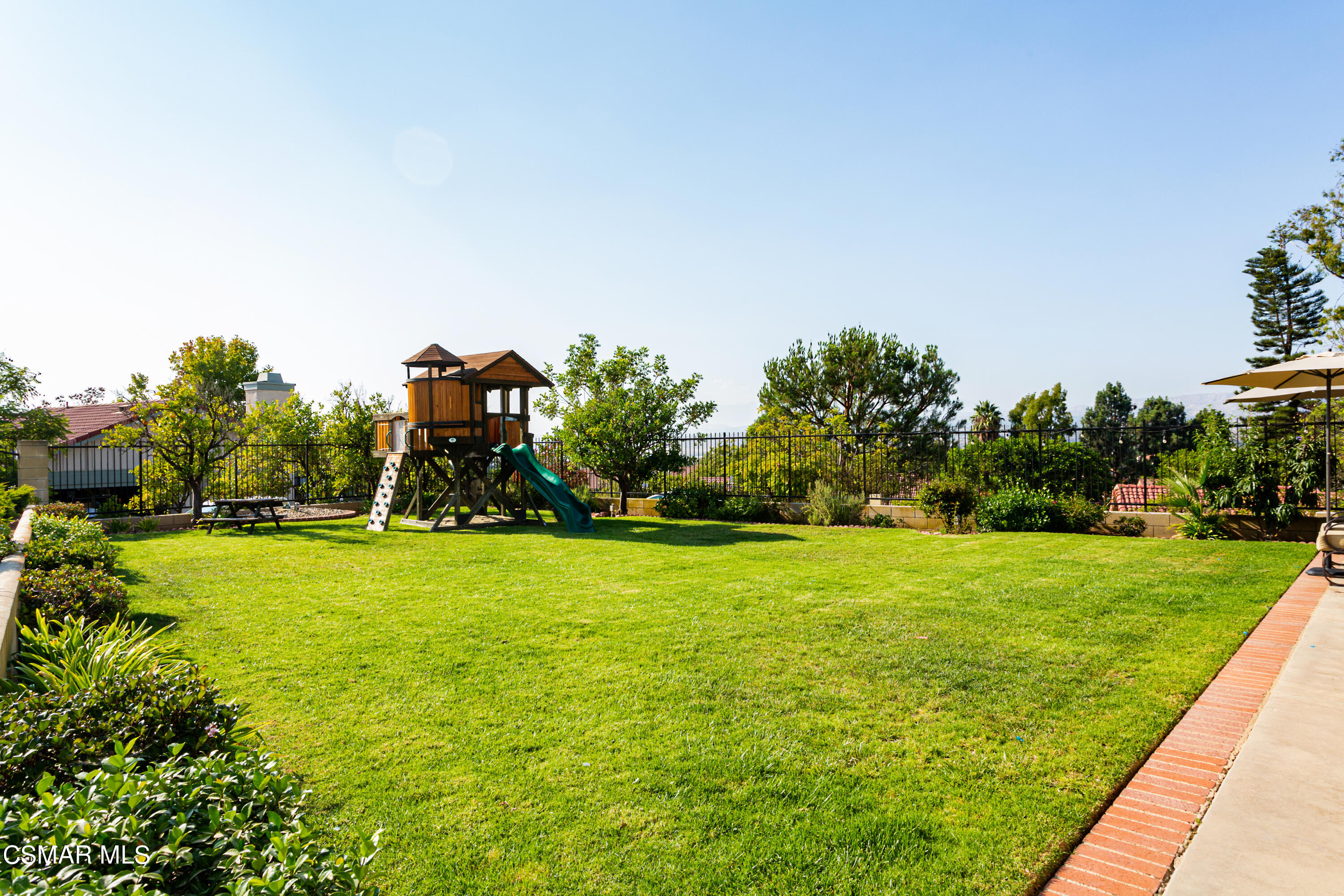 4249 Laurelhurst Road Moorpark, CA 93021 - Photo 30 of 30 a backyard of a house with lots of green space