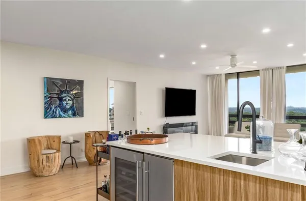 a bed room with a bed and a chair