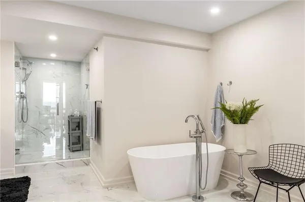 a room with a sink and a mirror