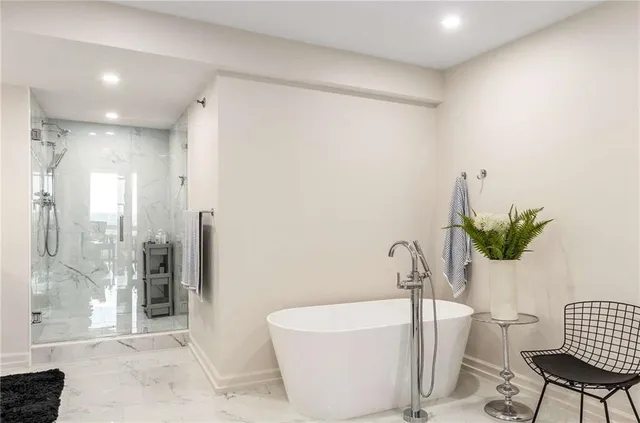 a room with a sink and a mirror