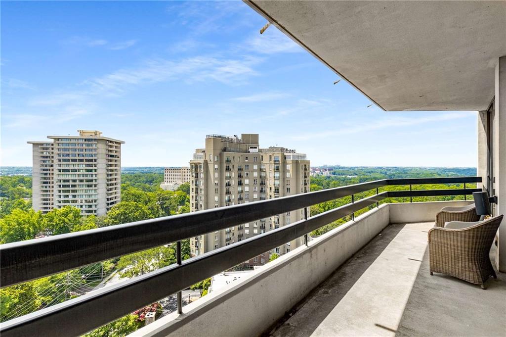 2660 Peachtree Road Northwest, Unit 18H Atlanta, GA 30305 - Photo 37 of 61 a view of swimming pool with outdoor seating