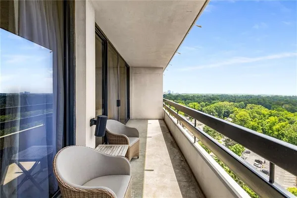 a view of a street with flower garden