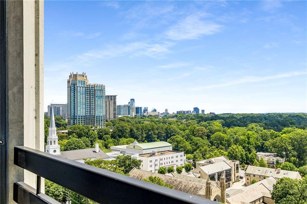 2660 Peachtree Road Northwest, Unit 18H Atlanta, GA 30305 - Photo 41 of 61 a view of a city from a balcony with city view