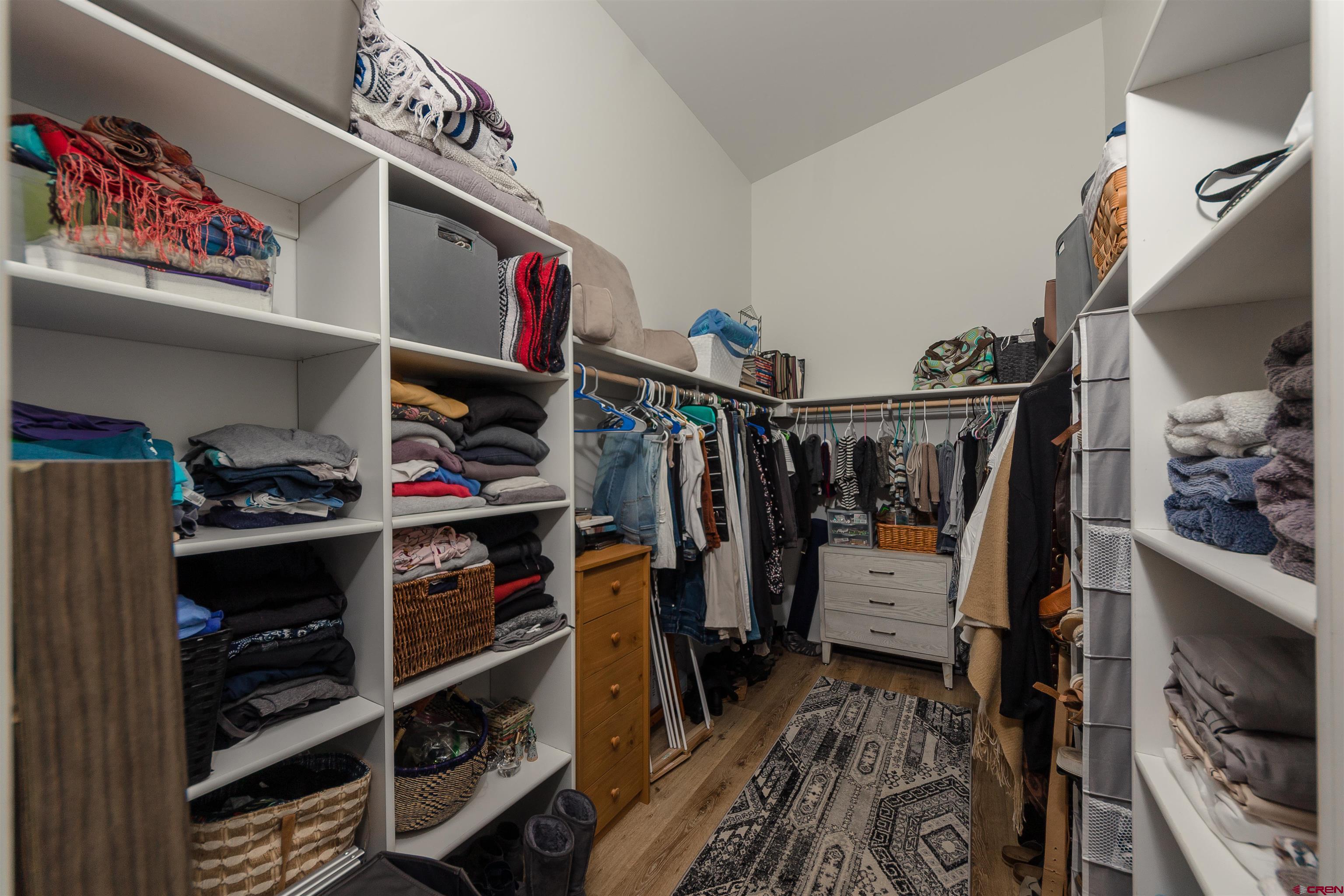 405 Far View Road Durango, CO 81303 - Photo 20 of 35 a view of walk in closet with clothes and shoes