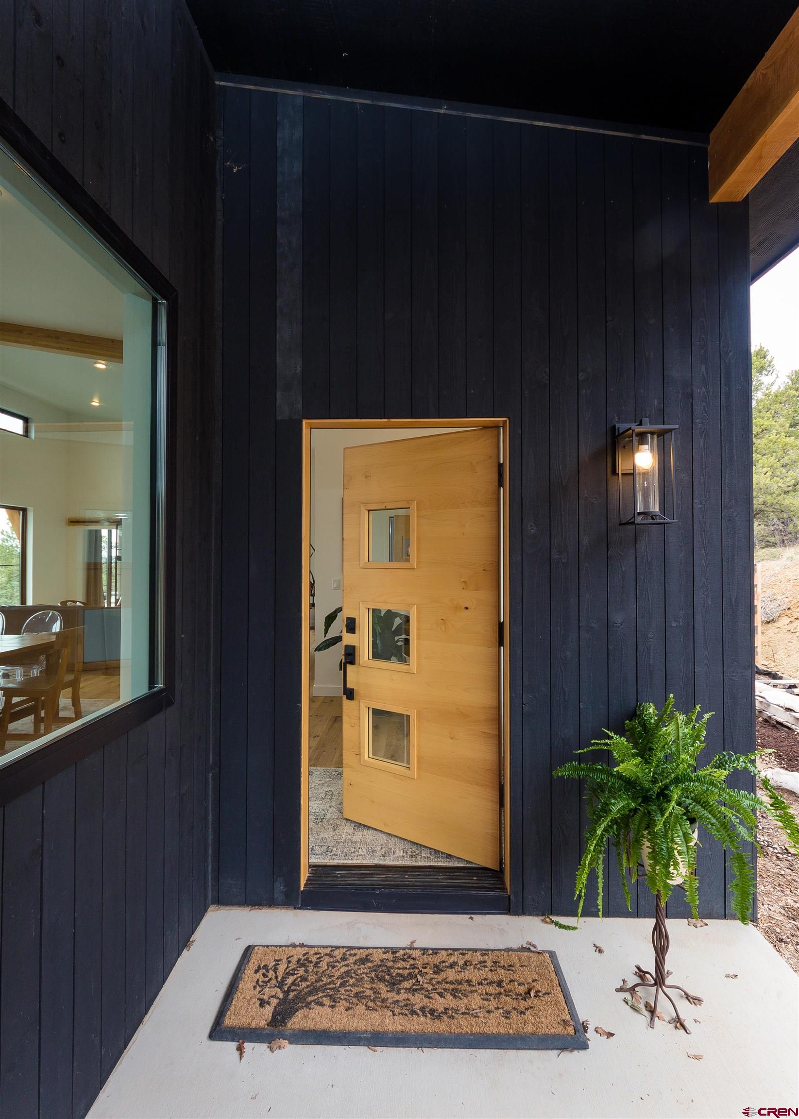 405 Far View Road Durango, CO 81303 - Photo 30 of 35 a view of entryway with a potted plant