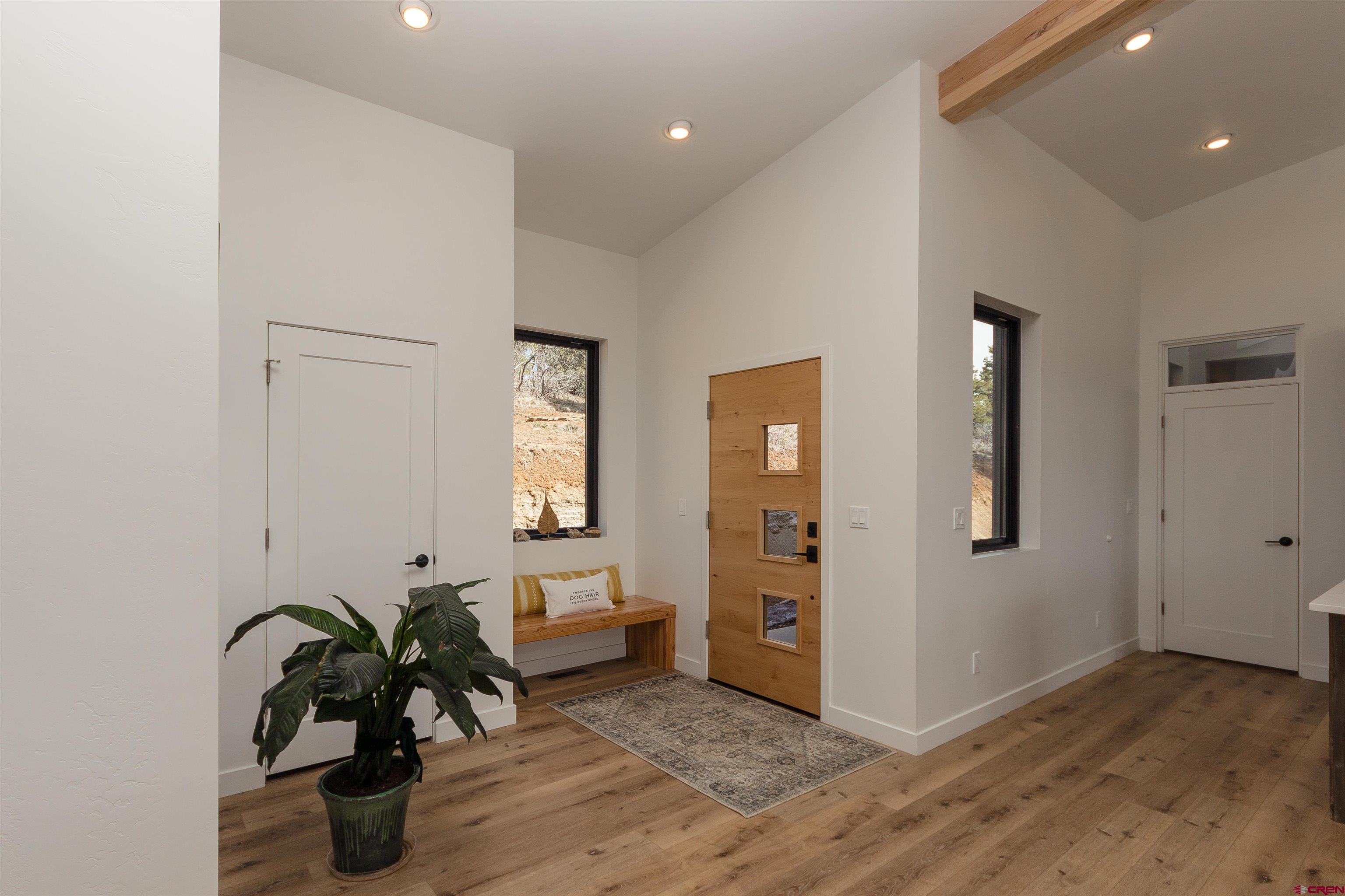 405 Far View Road Durango, CO 81303 - Photo 7 of 35 a room with furniture and entryway