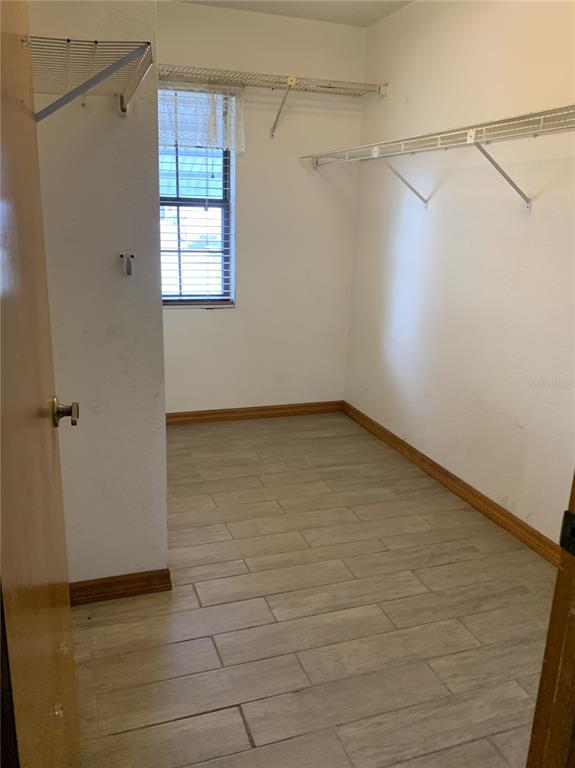 5140 Courtland Road Spring Hill, FL 34608 - Photo 14 of 20 a view of a room with racks on the wall